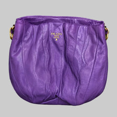 Coach, Guess and Prada Handbags